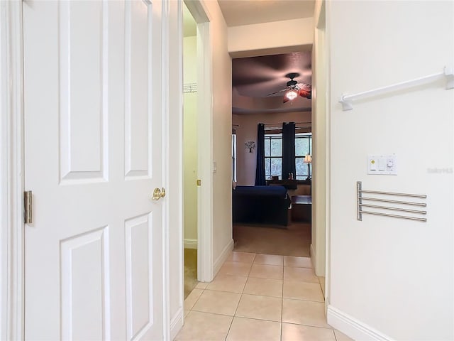 hallway with light tile patterned flooring