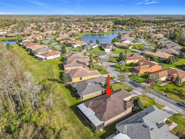 aerial view featuring a residential view and a water view