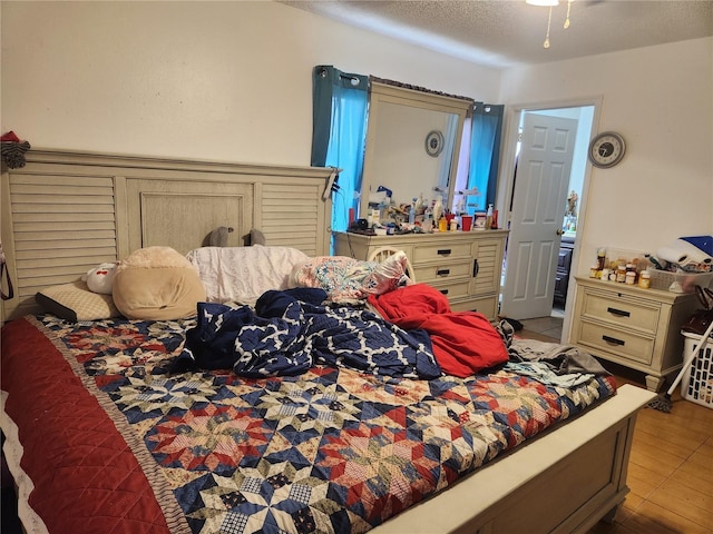 bedroom with a textured ceiling