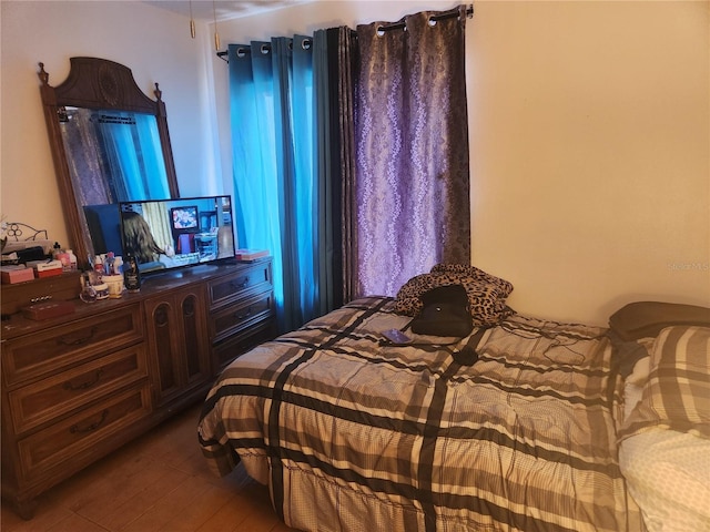 bedroom featuring hardwood / wood-style flooring