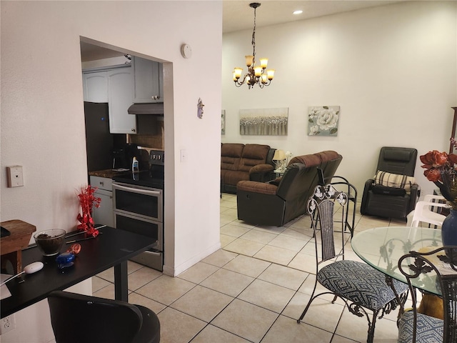 602 Caddy Dr, Kissimmee, FL 34759 - dining room with an inviting chandelier, light tile patterned floors, baseboards, and recessed lighting