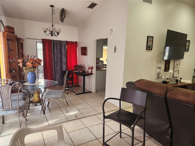 602 Caddy Dr, Kissimmee, FL 34759 - dining room with visible vents, a chandelier, light tile patterned flooring, and high vaulted ceiling