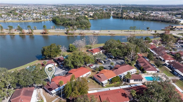 drone / aerial view with a water view