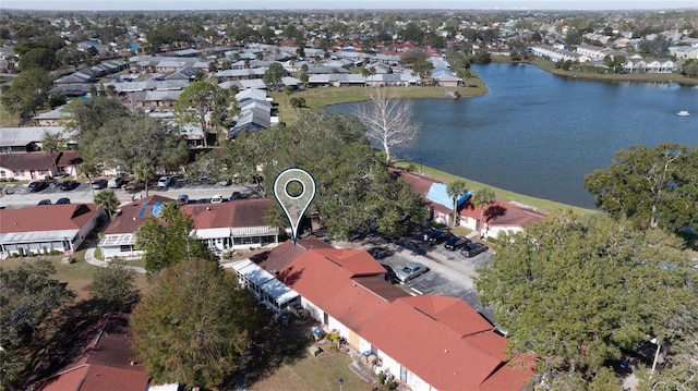 birds eye view of property featuring a water view