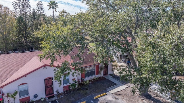 46 W Marbrisa Way, Kissimmee, FL 34743 - view of front of house featuring stucco siding and roof with shingles