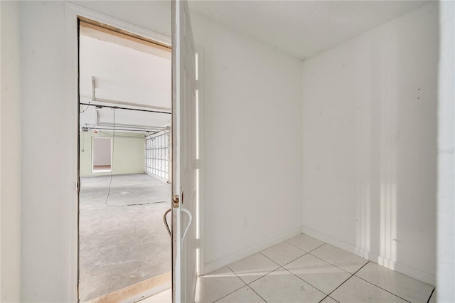 interior space featuring light tile patterned floors