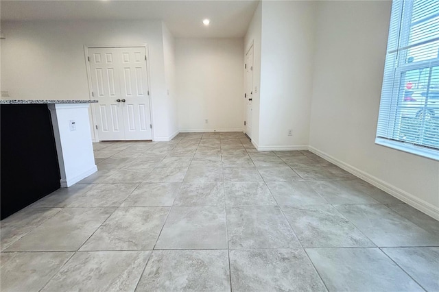 view of tiled spare room