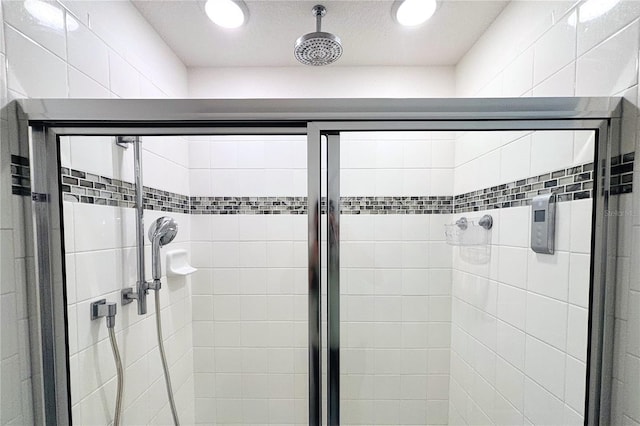 bathroom featuring an enclosed shower