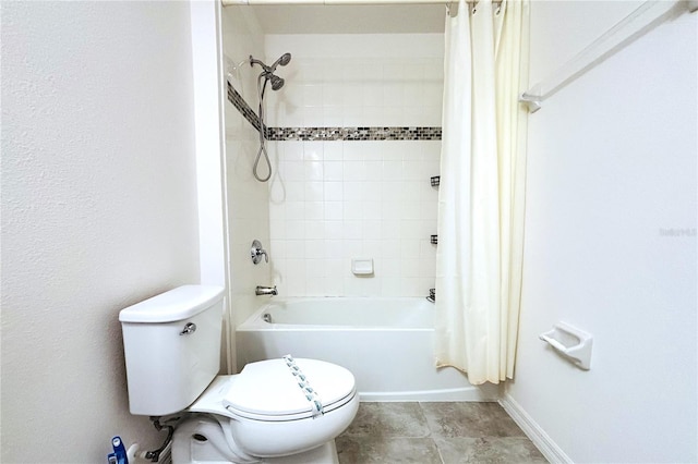 bathroom with toilet and shower / bath combo