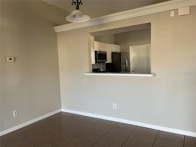 view of tiled empty room