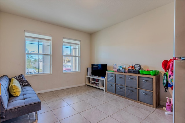 game room with light tile patterned floors