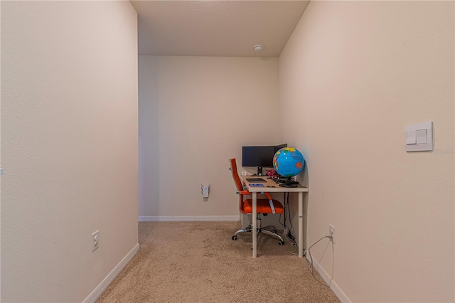 office area featuring light colored carpet