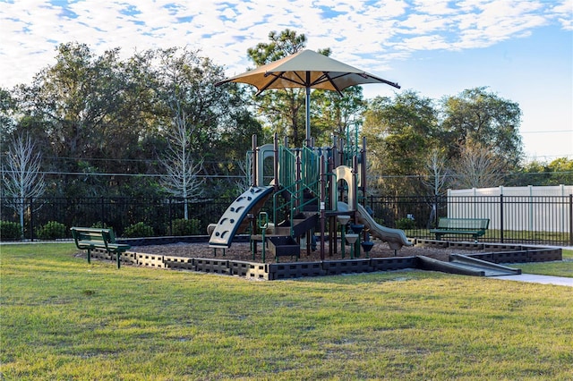 view of jungle gym with a yard