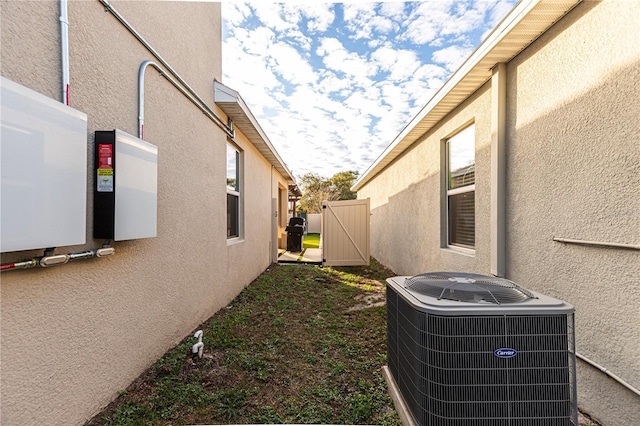 view of property exterior with central air condition unit