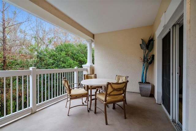 balcony featuring outdoor dining area