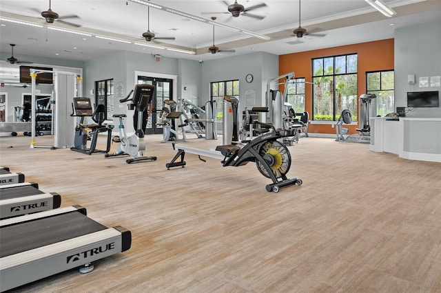 exercise room with recessed lighting, carpet floors, baseboards, ornamental molding, and a tray ceiling