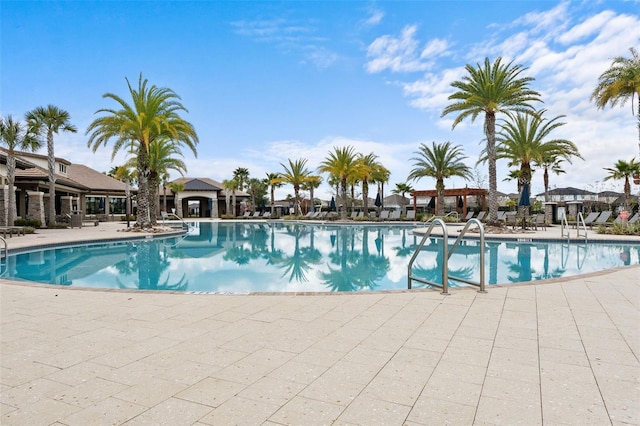 community pool with a patio