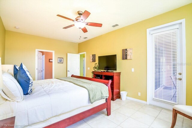 tiled bedroom featuring ceiling fan and access to outside