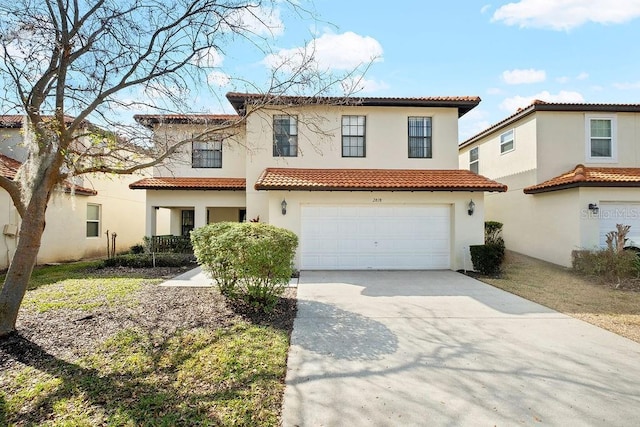 mediterranean / spanish-style home featuring a garage