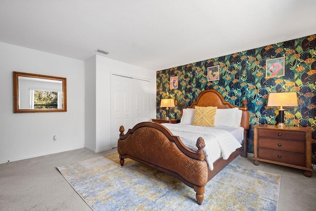 bedroom featuring a closet and carpet