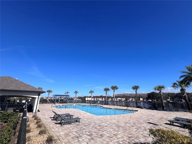 view of swimming pool featuring a gazebo and a patio