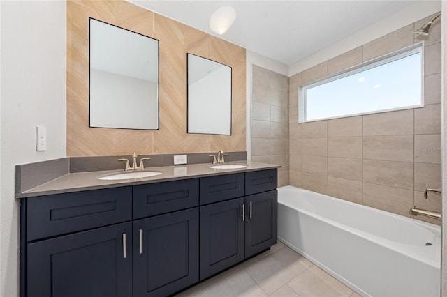 bathroom featuring tile patterned flooring, vanity, a washtub, and wooden walls