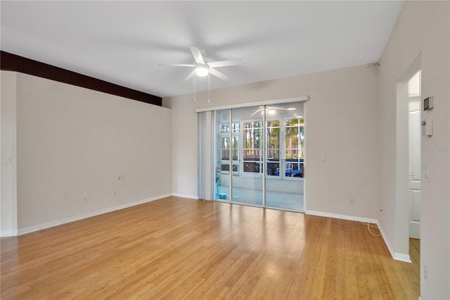 spare room featuring ceiling fan and light wood-type flooring