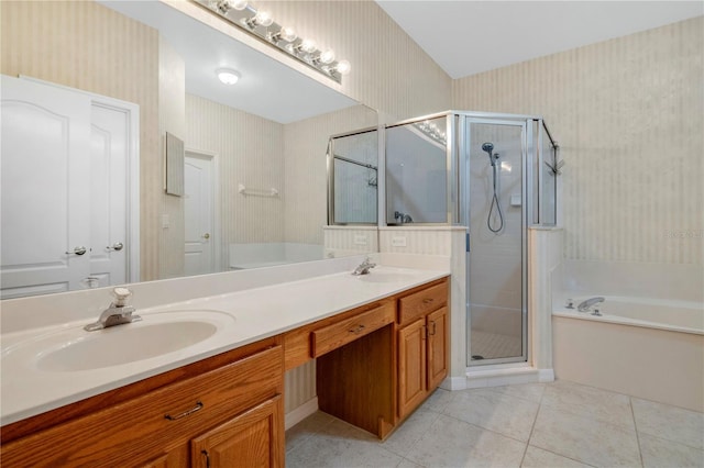 bathroom featuring vanity, separate shower and tub, and tile patterned floors