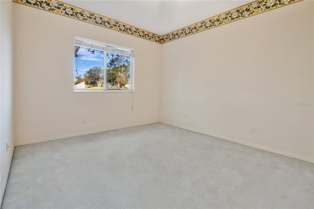 empty room featuring carpet flooring