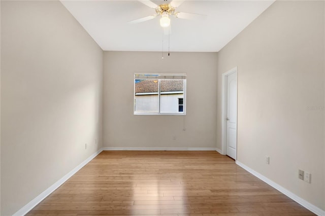 unfurnished room with ceiling fan and light hardwood / wood-style floors