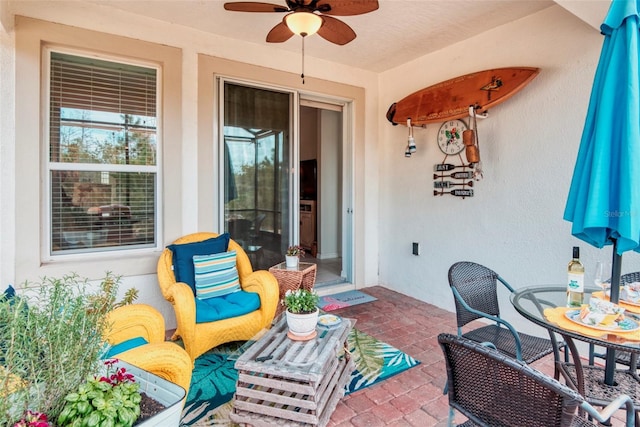 view of patio / terrace with ceiling fan