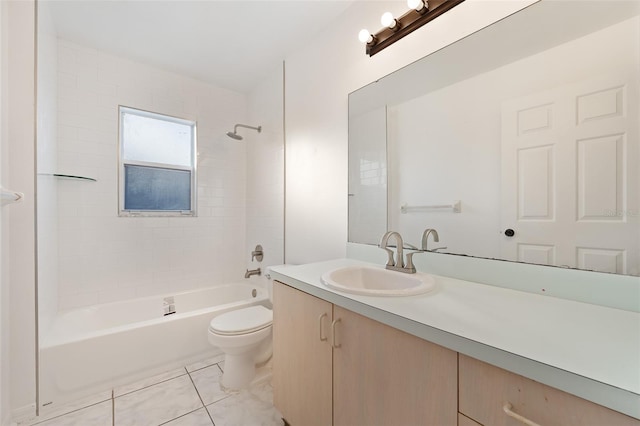 full bathroom with tiled shower / bath combo, vanity, tile patterned floors, and toilet