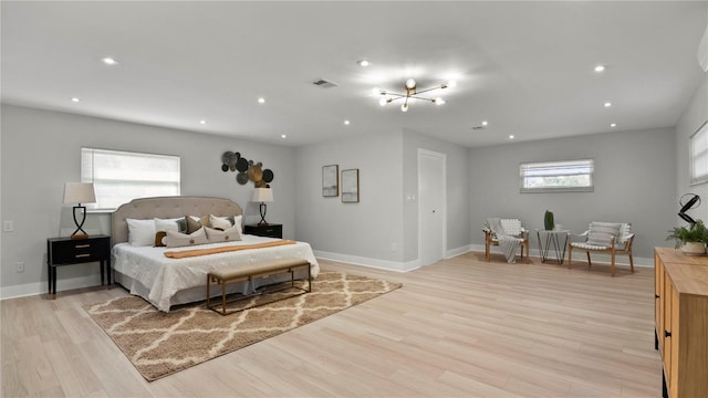 bedroom with light wood-type flooring