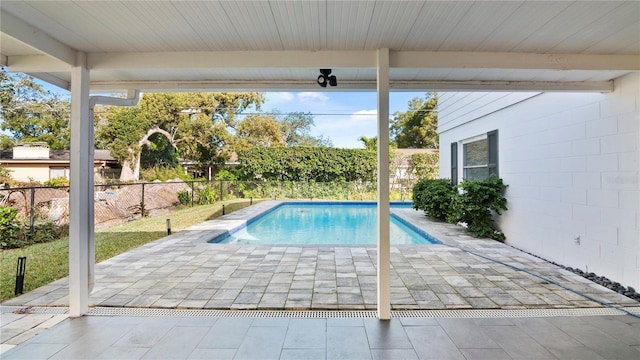 view of pool featuring a patio