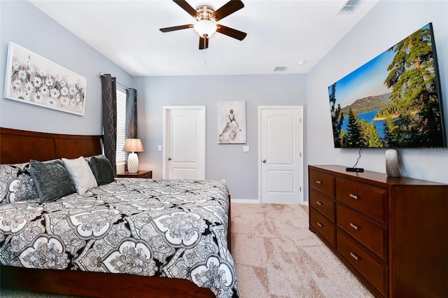 bedroom with light colored carpet and ceiling fan