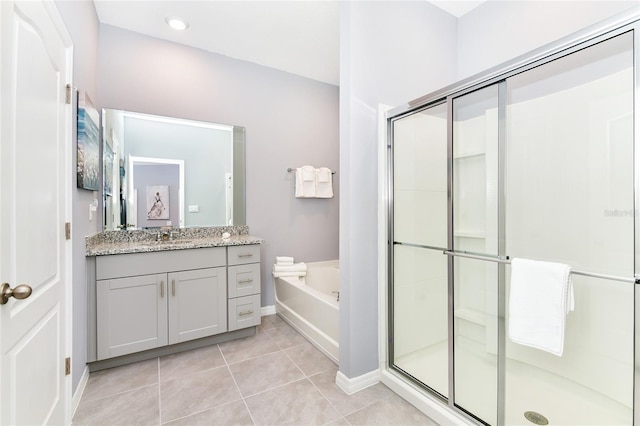 bathroom with vanity, separate shower and tub, and tile patterned floors