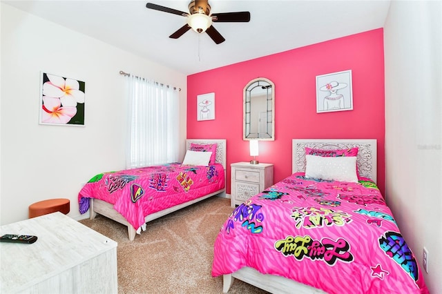 bedroom with ceiling fan and carpet