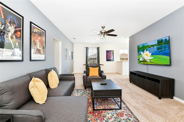 living room with light carpet and ceiling fan