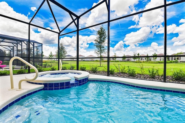 view of swimming pool with an in ground hot tub, a lanai, and a yard