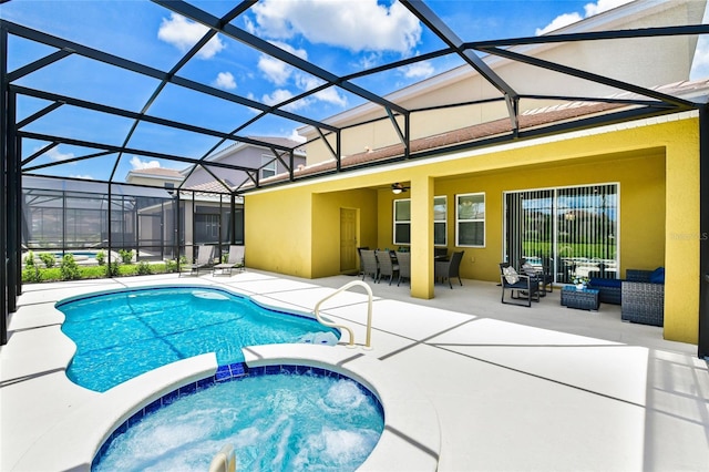 view of pool with an outdoor living space, a patio, an in ground hot tub, and glass enclosure