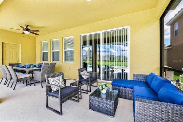 view of patio featuring an outdoor hangout area and ceiling fan