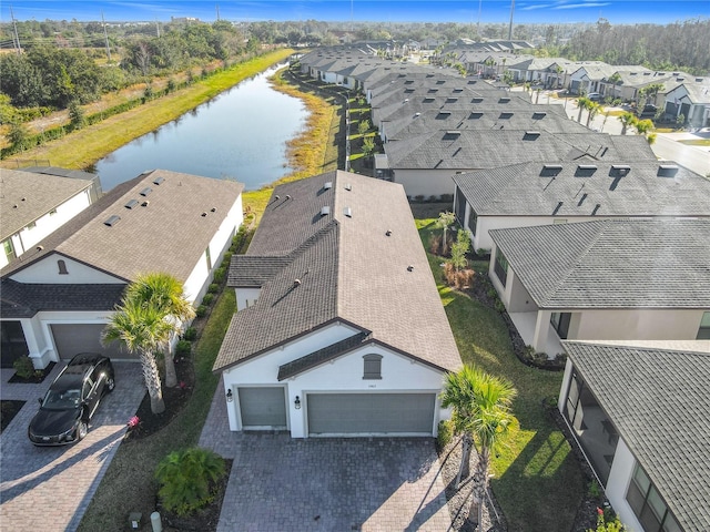 drone / aerial view featuring a water view