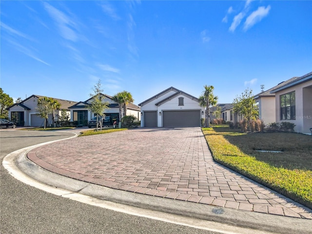 ranch-style house featuring a garage