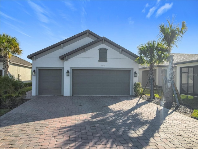 ranch-style house featuring a garage