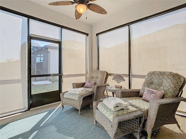 sunroom / solarium with ceiling fan