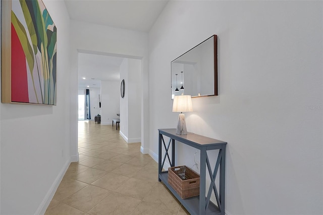 hallway featuring light tile patterned flooring