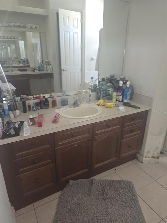 bathroom featuring vanity and tile patterned floors