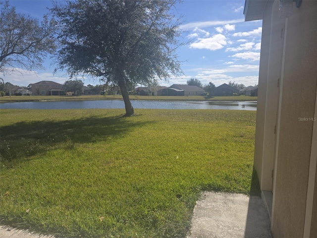 view of yard with a water view