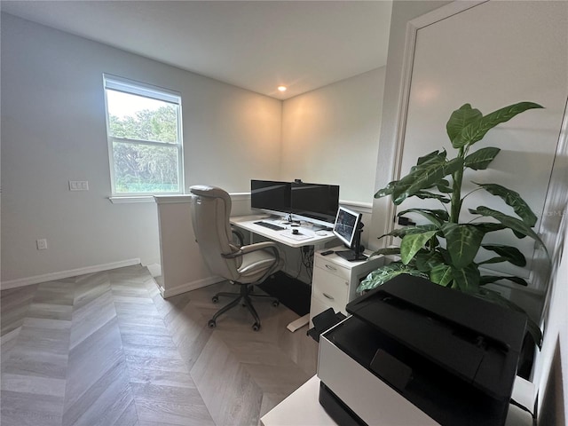 office area with light parquet floors