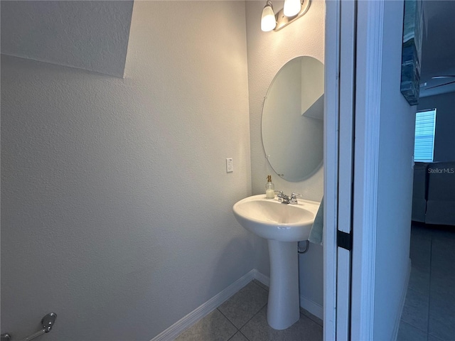 bathroom featuring tile patterned flooring